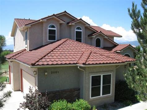 spanish style house with metal roof|spain style homes.